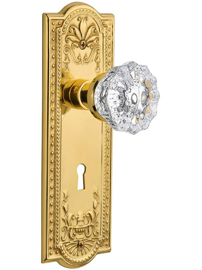 Meadows Door Set with Fluted-Crystal Glass Knobs and Keyhole Single Dummy in Polished Brass.